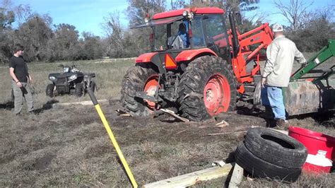 cleaning mud Uzbekistan|Getting a Tractor Out of Mud .